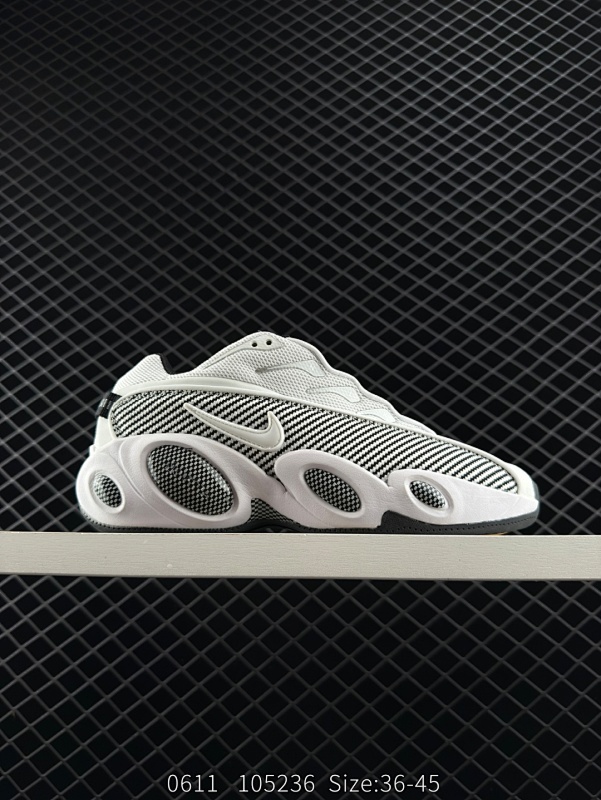 180 耐克NOCTA x Nike Glide 织物潮流百搭 复古低帮篮球鞋 实拍首发  采用黑色网眼鞋面 搭配以碳纤维为灵感的挡泥板和与中底相配的Swoosh 标志 “NIKE”字样沿孔眼向下延伸